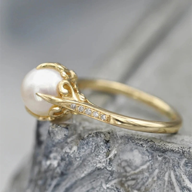 Bague vintage avec perle au centre | Or