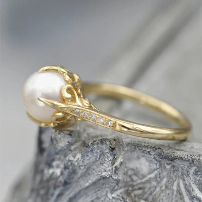 Bague vintage avec perle au centre | Or