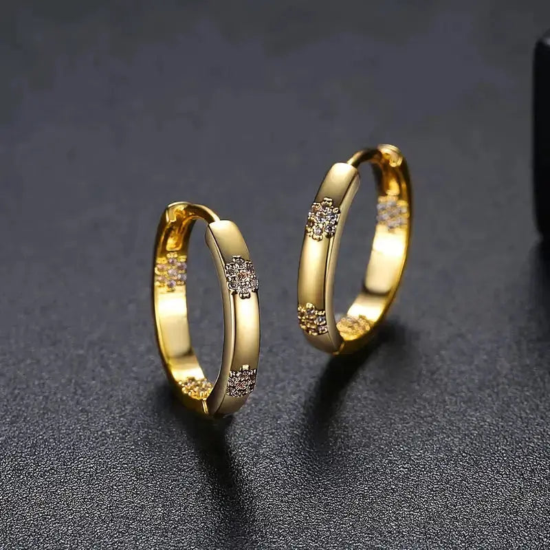 Boucles d'oreilles vintage roue avec fleur | Or
