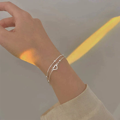 Bracelet ajustable avec cœur | Or blanc